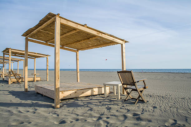 istock Wooden beds on the beach 610019206