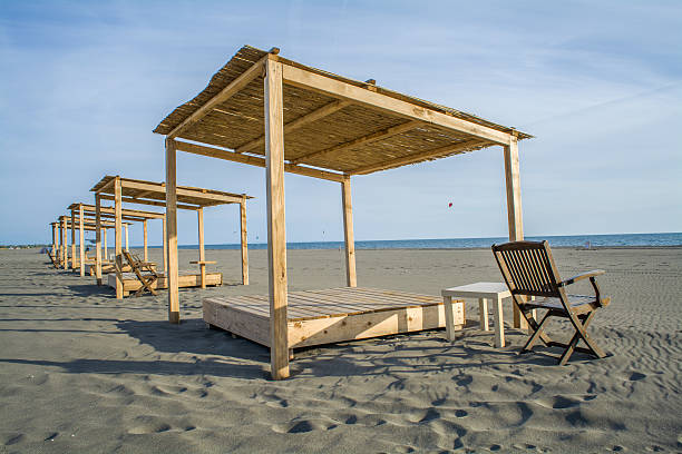 istock Wooden beds on the beach 610019392