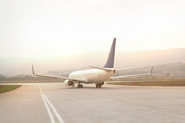 istock Airplanes on port at sunset 610020210