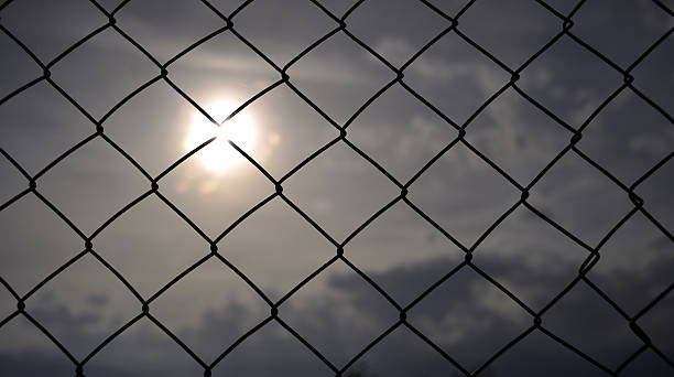 istock metal fence with mesh 610033866