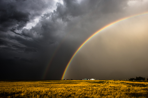 We watched as the storm dissipated in front of us and headed out across the Kansas / Colorado border, leaving this beautiful scene with a vivid rainbow in it's wake.