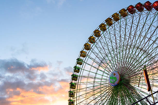 istock Fair Ferris Wheel at sunset 610034988