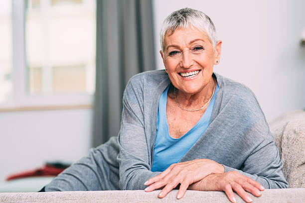 istock happy senior woman 610035582