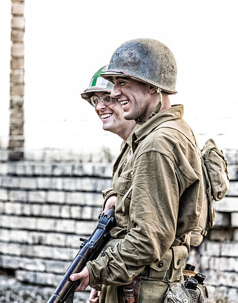 istock World War II US Army Medic and Soldier Laughing 610035720