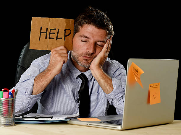 istock tired desperate businessman in office stress working asking for help 610036666