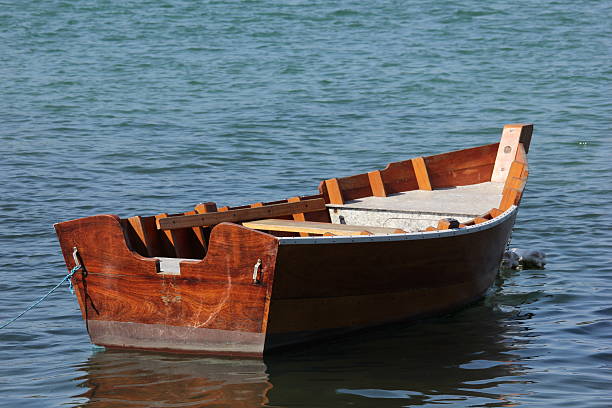 istock Rustic little boat made of wood 610039094