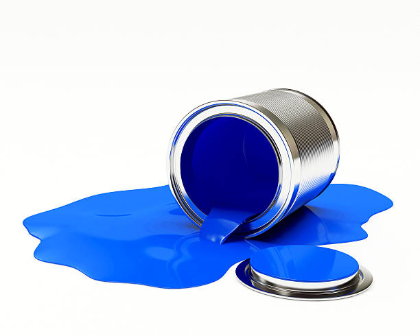 istock Can spilled blue paint on white background 610039640
