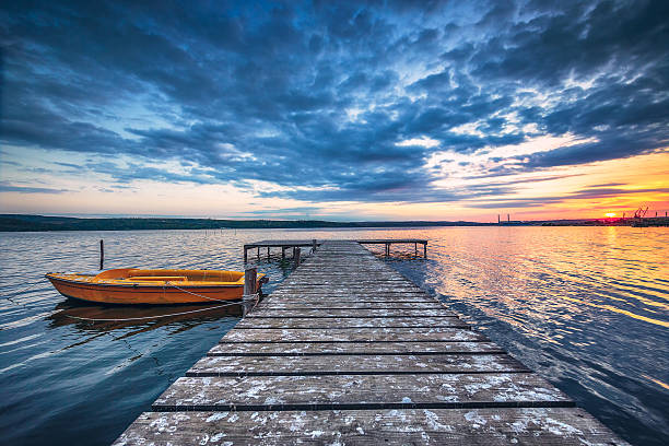 istock Small Dock and Boat at the lake 610040540