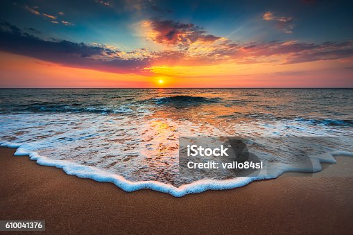 istock Beautiful sunrise over the sea 610041376