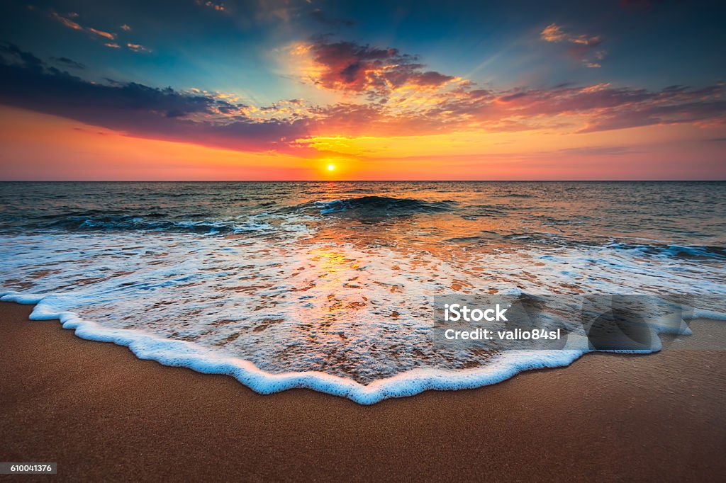 Beautiful sunrise over the sea Beautiful cloudscape over the sea, sunrise shot Beach Stock Photo
