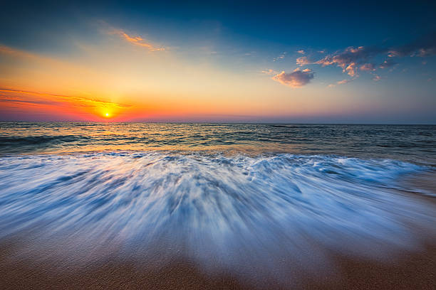istock Beautiful sunrise over the sea 610041578