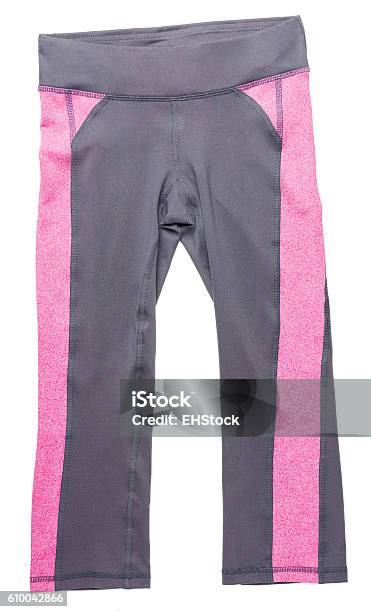 Pink And Gray Womens Athletic Pants On White Stock Photo - Download Image Now - White Background, Yoga Pants, Clothing