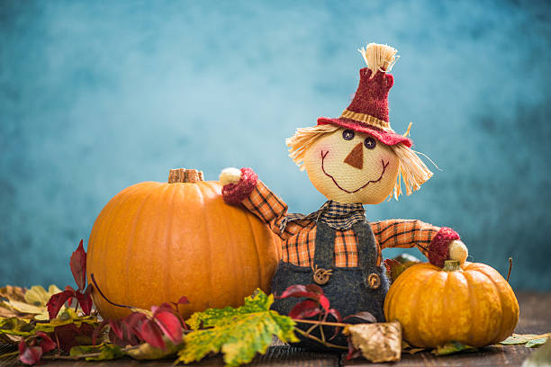 istock Scarecrow farmer show autumn harvest 610042872