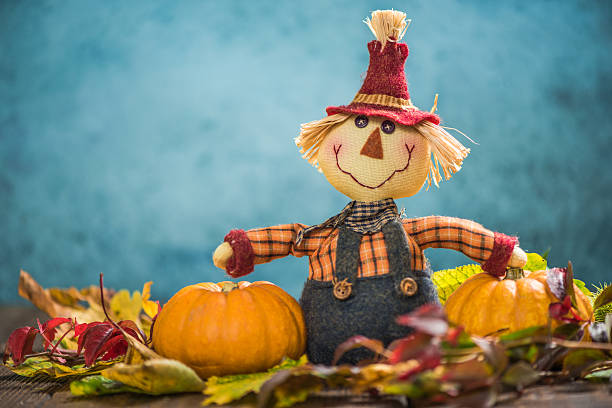 istock Scarecrow farmer show autumn harvest 610042944