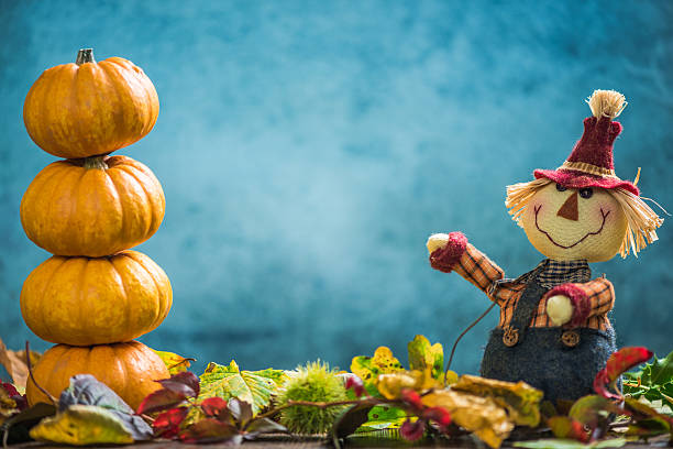 istock Farmer show autumnal harvest and pumpkins 610043426
