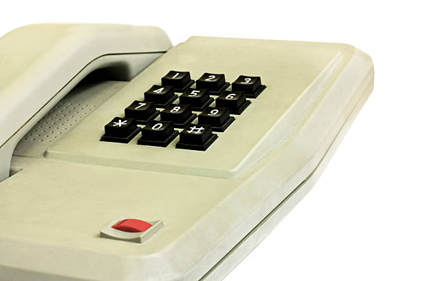 istock Old simple office desk phone 610046102