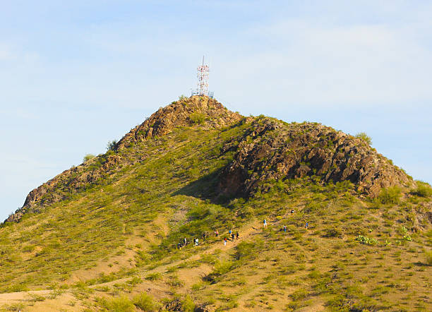 istock People Hiking a Hill - Stock Image 610046384