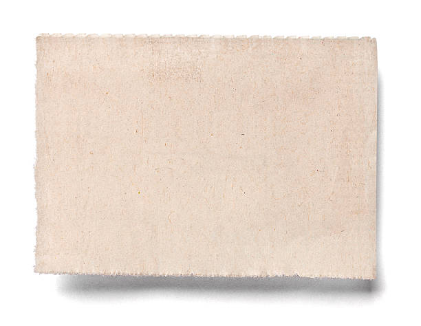 istock white news paper ripped message background 610050710