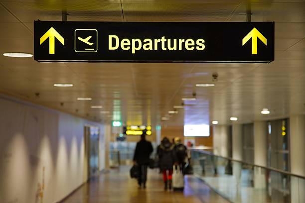 istock Departures airport sign 610114234