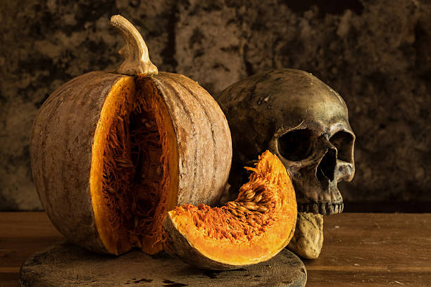 istock still life with skull and candle with candlestick 610114732
