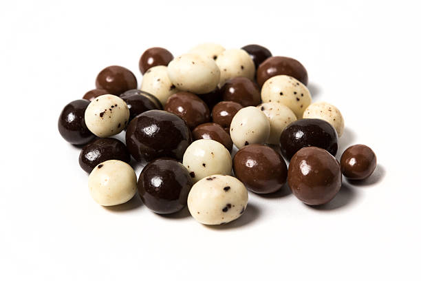 istock Chocolate expresso beans isolated on white background 610116364