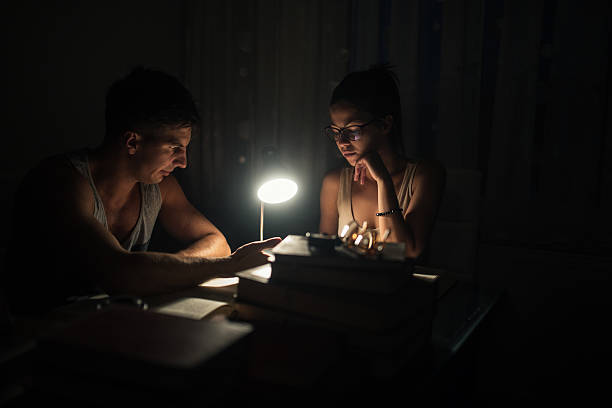 istock Couple of students studying 610117452