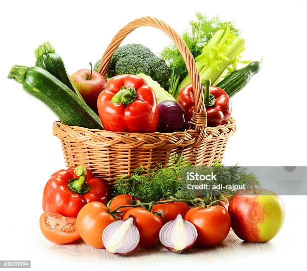 Composition With Raw Vegetables And Wicker Basket Isolated On White Stock Photo - Download Image Now