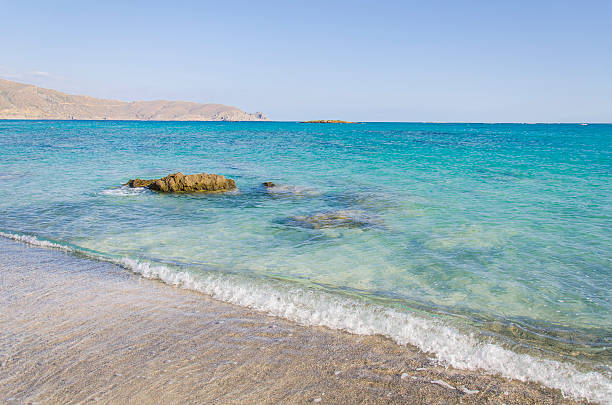 This landscape photo was taken in Europe, Greece, Peloponnese, in summer. It shows the coast around Stoupa, under the Sun.