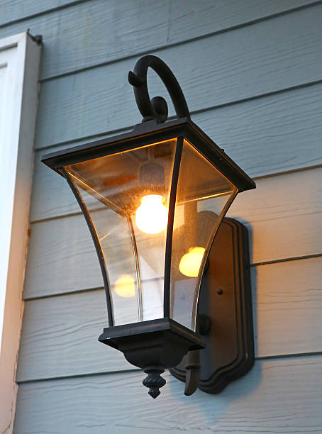 istock Vintage lantern on wooden wall 610121750