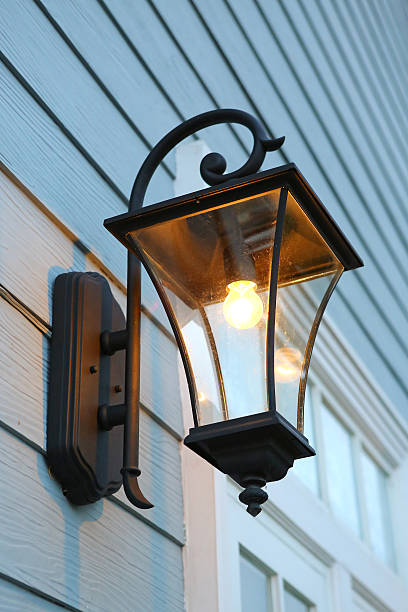 istock Vintage lantern on wooden wall 610121780