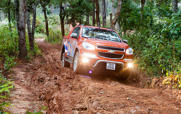 Chevrolet Colorado pick-up car Mocchau, Vietnam - Jan 9, 2015: Chevrolet Colorado pick-up car running on the off-road in test drive in Vietnam. Chevrolet stock pictures, royalty-free photos & images