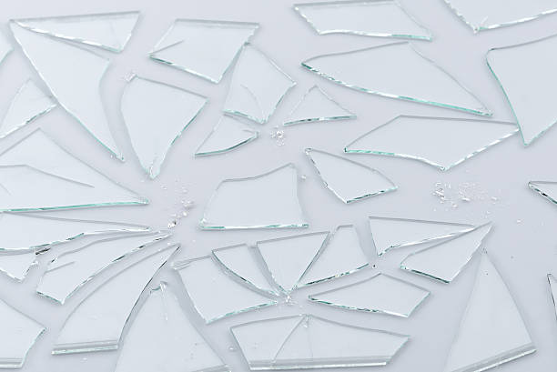 istock Broken glass, cracked glass on white 610124346