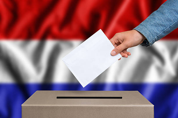 istock Election in Netherlands - voting at the ballot box 610125076