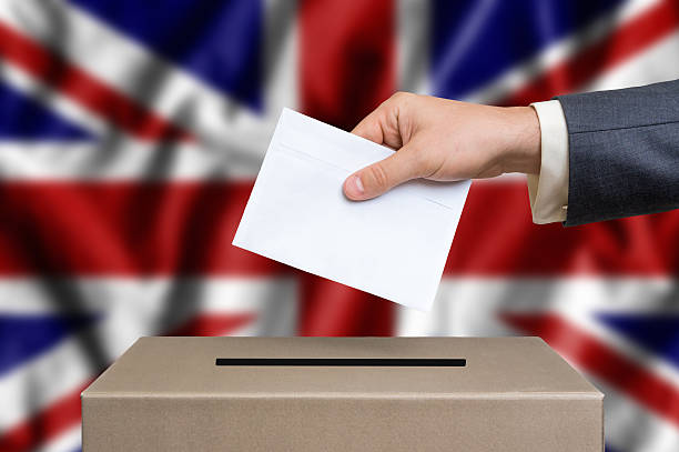 istock Election in Great Britain - voting at the ballot box 610125378
