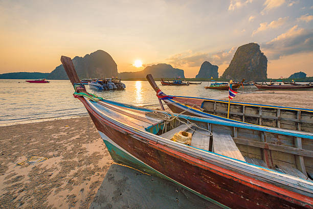 istock Beautiful sunset at tropical beach in asia thailand 610128092