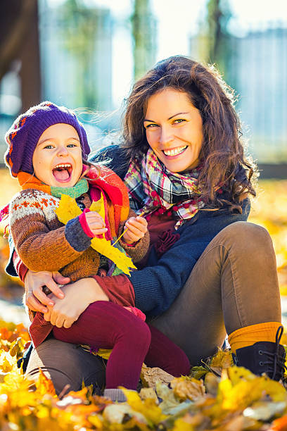 istock Mother and daughter in the park 610129652