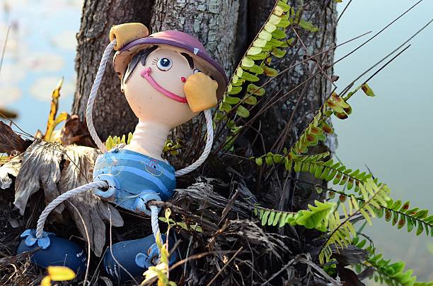 clay doll in the garden from thailand