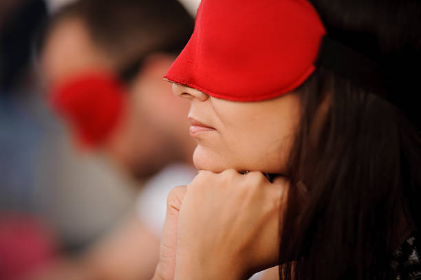 istock girl in mask playing mafia game 610131088