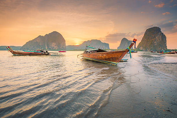 istock Beautiful sunset at tropical beach in asia thailand 610131680