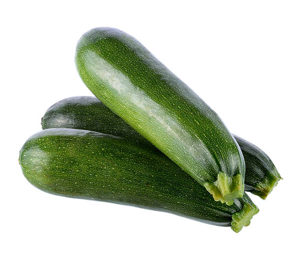 istock green zucchini vegetables isolated on white 610131726