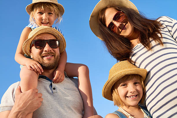 istock Joyous Family with Two Daughters on Vacation 610131990