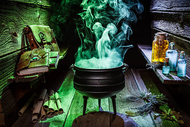 istock Witcher cauldron with blue and green smoke for Halloween 610133064