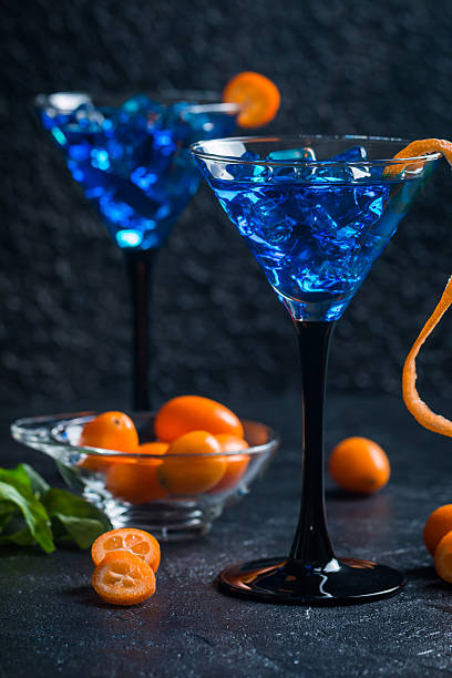 istock Blue cocktail in martini glasses 610134354