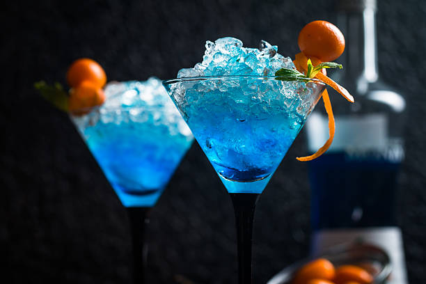 istock Blue cocktail in martini glasses 610134426