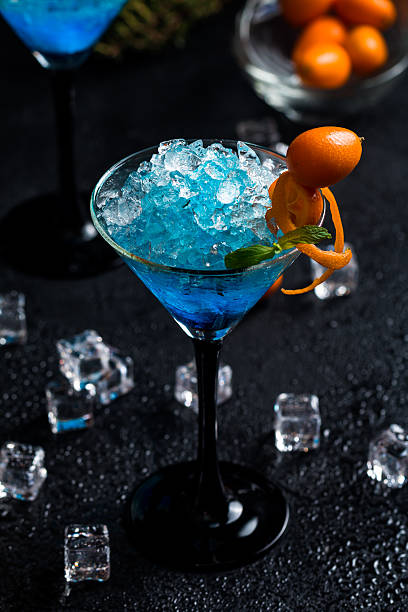 istock Blue cocktail in martini glasses 610134476
