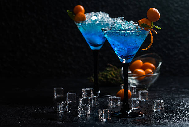 istock Blue cocktail in martini glasses 610134554