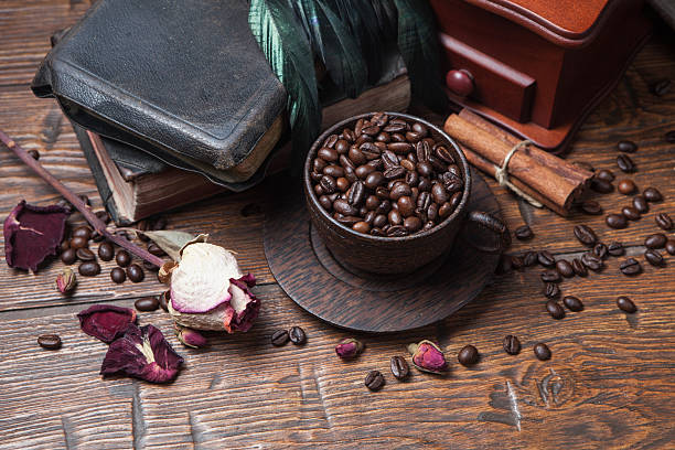 istock Cup of coffee, dry rose and grinder 610136924