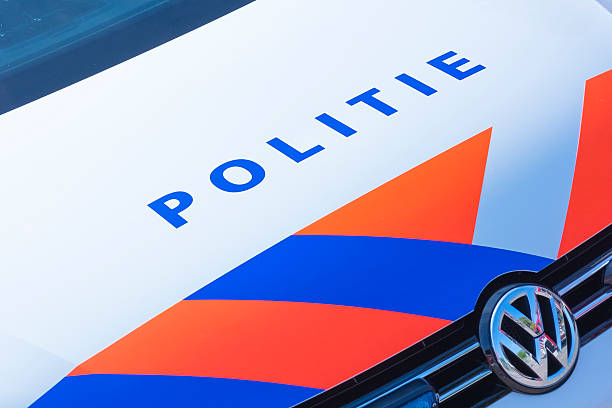 Police - Politie in Dutch on a police car front stock photo