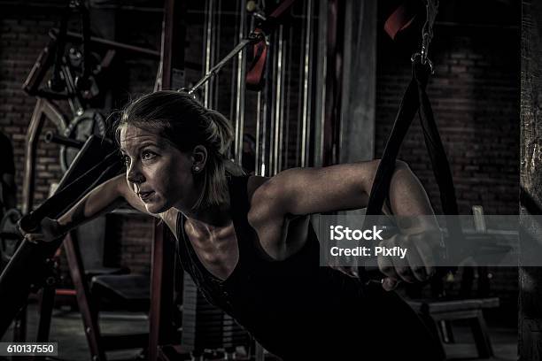 Woman Doing Exercises In The Gym Stock Photo - Download Image Now - Teenage Girls, Sweat, Gym