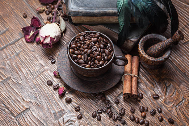 istock Cup of coffee, dry rose and grinder 610137596